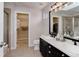 Elegant bathroom with double vanity, walk-in shower, and separate toilet at 2311 Decatur St, Denver, CO 80211