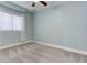 Bright bedroom with window, neutral walls, and carpet at 2311 Decatur St, Denver, CO 80211