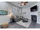 Cozy Gathering room featuring a fireplace and ample natural light at 2311 Decatur St, Denver, CO 80211
