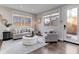 Cozy living room featuring a comfortable sofa and access to a patio at 2311 Decatur St, Denver, CO 80211
