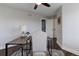 Bright home office with a corner desk and ample storage at 2311 Decatur St, Denver, CO 80211