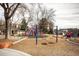 Community playground with swings and play structures at 2311 Decatur St, Denver, CO 80211