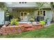 Brick patio with seating area, awning, and grill at 4505 S Yosemite St # 125, Denver, CO 80237