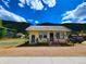 Yellow cottage with wood siding, and a small front yard at 2752 Miner St, Idaho Springs, CO 80452