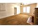 Spacious living room featuring hardwood floors and a brick fireplace at 2752 Miner St, Idaho Springs, CO 80452