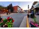 Evening view of a charming town square with shops and flowers at 2752 Miner St, Idaho Springs, CO 80452