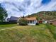 House exterior and yard with mountain views at 2752 Miner St, Idaho Springs, CO 80452