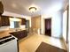 Kitchen with wood cabinets, gas range and exposed brick wall at 2752 Miner St, Idaho Springs, CO 80452