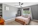 Bedroom with large window and neutral wall color at 6775 Saddleback Ave, Firestone, CO 80504