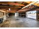 Spacious garage interior with high ceilings and ample storage at 6316 Tennyson St, Arvada, CO 80003