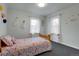 Bright bedroom with wood floors and window coverings at 6316 Tennyson St, Arvada, CO 80003