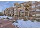 Brick building exterior with landscaping and a walkway at 2700 E Cherry Creek South Dr # 313, Denver, CO 80209