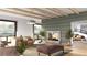Spacious living room with a fireplace and plenty of natural light at 12983 W Ida Ave # 201, Littleton, CO 80127