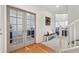 Bright entryway with French doors leading to an office at 6650 Sunburst Ave, Firestone, CO 80504