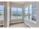 Bedroom with large windows offering ample natural light at 1765 Peak Loop, Broomfield, CO 80023