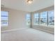 Spacious bedroom featuring ample natural light and city views at 1765 Peak Loop, Broomfield, CO 80023