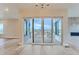 Open dining area with large sliding glass doors offering scenic views at 1765 Peak Loop, Broomfield, CO 80023