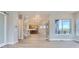 Spacious living area with hardwood floors and views of the backyard at 1765 Peak Loop, Broomfield, CO 80023