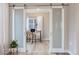 Home office with barn doors and a modern desk setup at 1765 Peak Loop, Broomfield, CO 80023