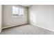 Well-lit bedroom with carpet flooring and a window at 16870 Mckay Dr, Mead, CO 80542