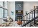 Modern living room features a fireplace and comfortable seating at 4273 E 8Th Ave, Denver, CO 80210
