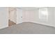 Finished basement bedroom with gray carpet at 300 Inca St, Denver, CO 80223