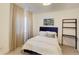 Cozy bedroom with a queen bed and stylish decor at 4224 E Dickenson Pl, Denver, CO 80222