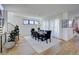 Elegant dining room with a large table and hardwood floors at 4224 E Dickenson Pl, Denver, CO 80222