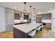 Contemporary kitchen featuring stainless steel appliances and an island at 4224 E Dickenson Pl, Denver, CO 80222