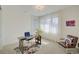 Bright home office with a desk and comfortable seating at 4224 E Dickenson Pl, Denver, CO 80222