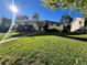 Ranch style home with well-manicured lawn and mature trees at 2789 S Ivan Way, Denver, CO 80227