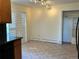 Bright dining area with tile floors and access to a patio at 2789 S Ivan Way, Denver, CO 80227