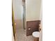 Bathroom with shower and tiled floor at 2789 S Ivan Way, Denver, CO 80227