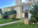 House exterior with landscaping and walkway at 2789 S Ivan Way, Denver, CO 80227