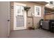 Private backyard with a deck and gated access at 1811 S Quebec Way # 134, Denver, CO 80231