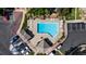 Community pool with ample deck space for lounging at 1811 S Quebec Way # 134, Denver, CO 80231