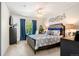 Bright bedroom with a comfortable bed and plenty of natural light at 1811 S Quebec Way # 134, Denver, CO 80231