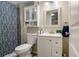 Basement bathroom with shower and updated vanity at 1811 S Quebec Way # 134, Denver, CO 80231