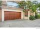 Attached garage with wood door at 1100 Cherokee St # 401, Denver, CO 80204