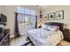 Spacious main bedroom with large windows and vaulted ceiling at 10750 Eliot Cir # 101, Westminster, CO 80234