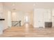 Spacious hallway with hardwood floors and access to other rooms at 11442 Autumn Moon St, Littleton, CO 80125