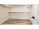 Spacious walk-in closet with ample shelving and hanging rods at 11442 Autumn Moon St, Littleton, CO 80125