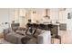 Modern kitchen with gray and white cabinets and an island at 11442 Autumn Moon St, Littleton, CO 80125