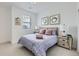 Charming bedroom with a double bed, nightstands, and window at 2362 W 167Th Ln, Broomfield, CO 80023