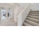 Upstairs hallway with carpeted flooring and access to bedrooms at 2362 W 167Th Ln, Broomfield, CO 80023