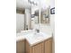 Bathroom with a vanity and a large mirror at 8707 E Florida Ave # 310, Denver, CO 80247