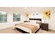 Spacious bedroom with large windows, bed, and nightstands at , Aurora, CO 80019