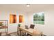 Home office features a large window, desk, and comfortable chair at , Aurora, CO 80019