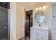 Clean bathroom with white vanity and an updated shower at 9552 Field Ct, Broomfield, CO 80021