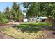 Large backyard with grassy area and playset at 7307 S Birch St, Centennial, CO 80122